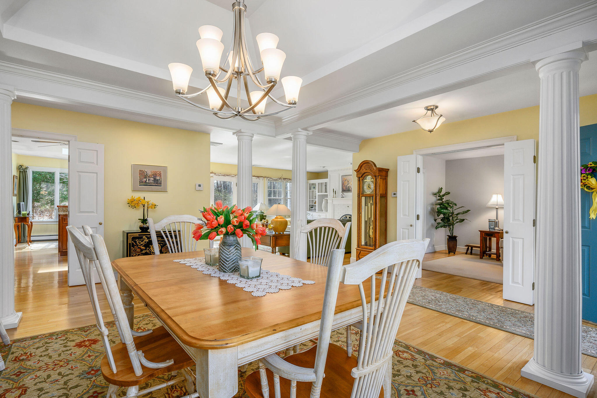 78 Red Maple Road Brewster, MA 02631 - Photo 18 of 39 a view of a dining room with furniture a chandelier and wooden floor