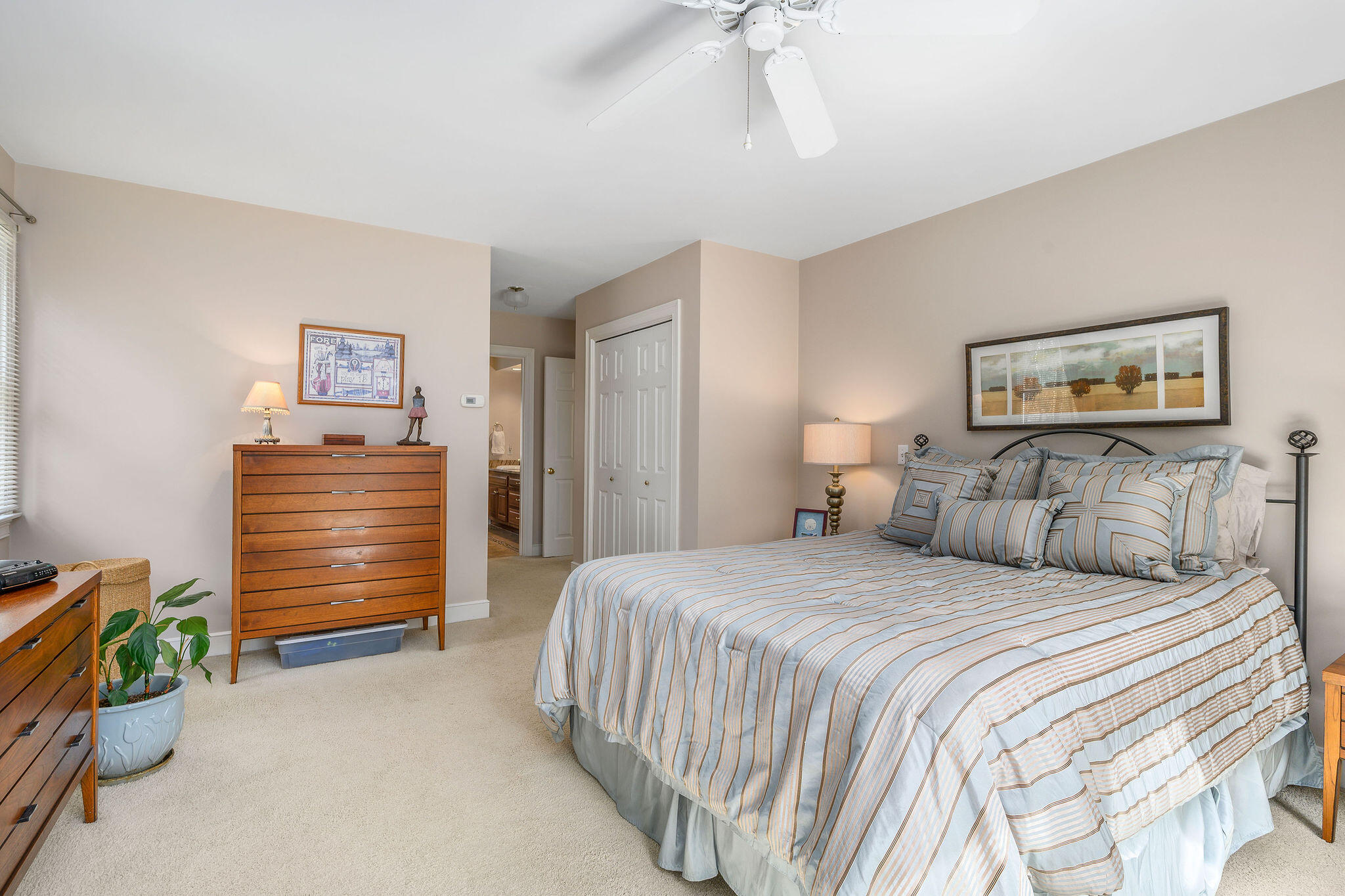 78 Red Maple Road Brewster, MA 02631 - Photo 22 of 39 a bedroom with a bed and a cabinets