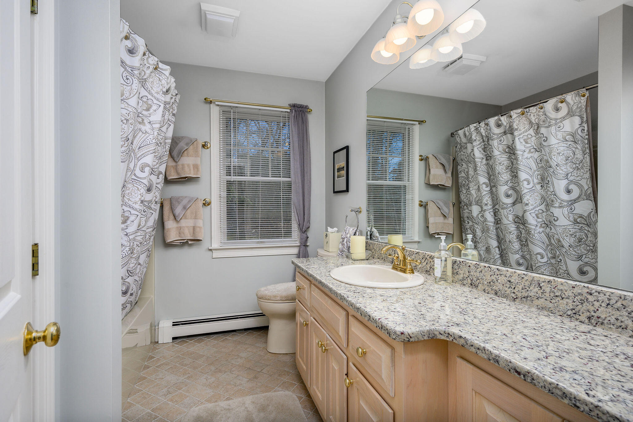 78 Red Maple Road Brewster, MA 02631 - Photo 25 of 39 a bathroom with a granite countertop sink and a mirror