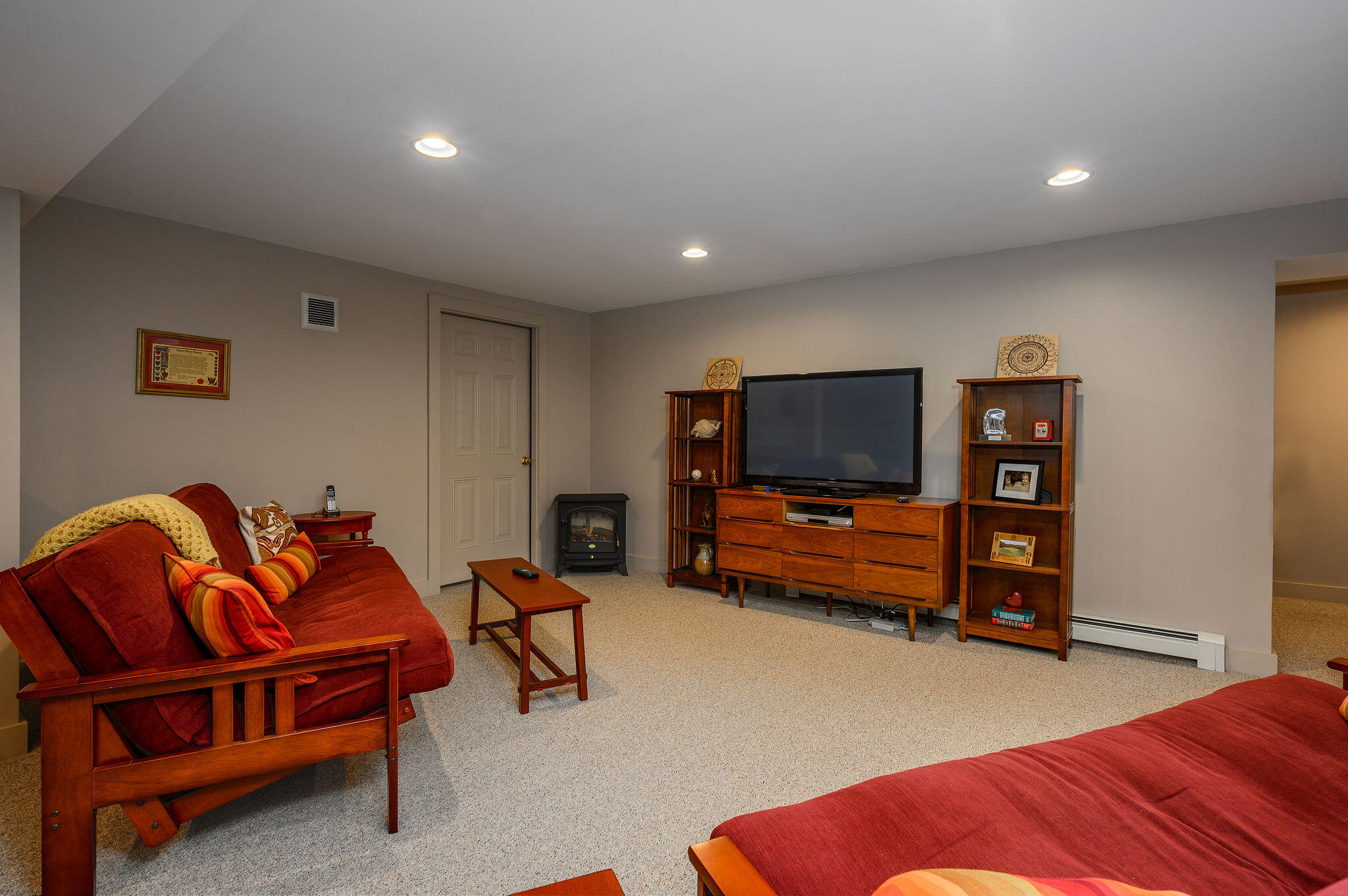 78 Red Maple Road Brewster, MA 02631 - Photo 31 of 39 a living room with furniture and a flat screen tv
