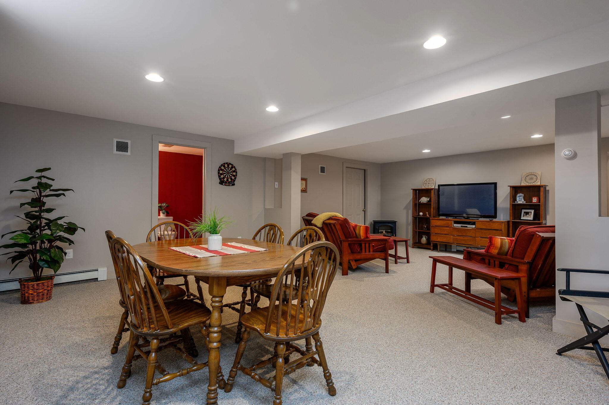 78 Red Maple Road Brewster, MA 02631 - Photo 32 of 39 a view of a dining room with furniture and a livingroom
