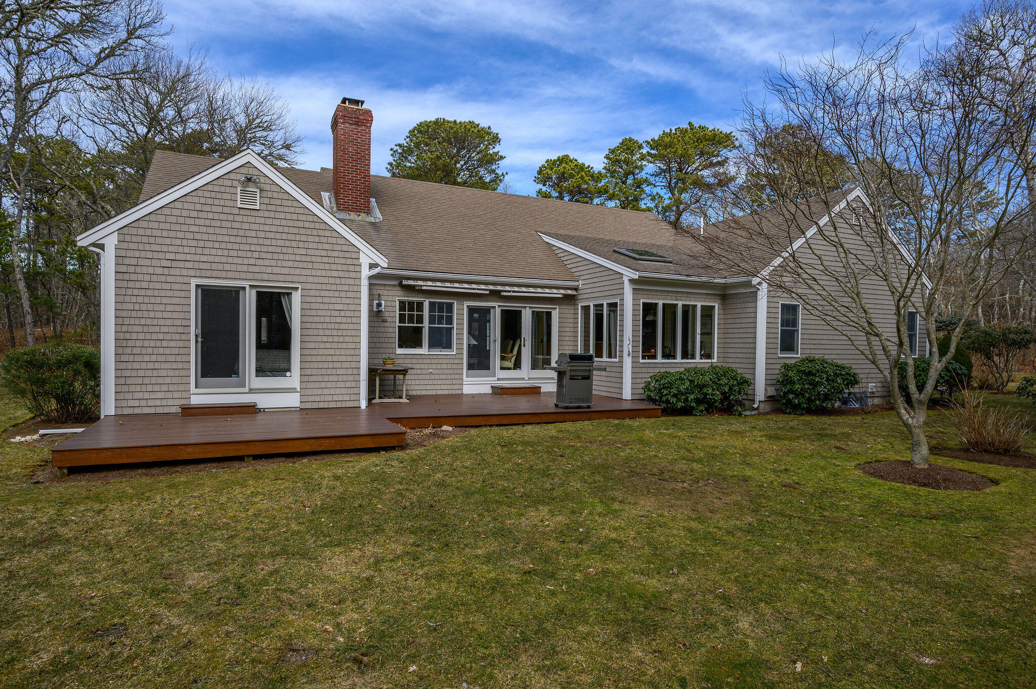 78 Red Maple Road Brewster, MA 02631 - Photo 35 of 39 a front view of a house with garden