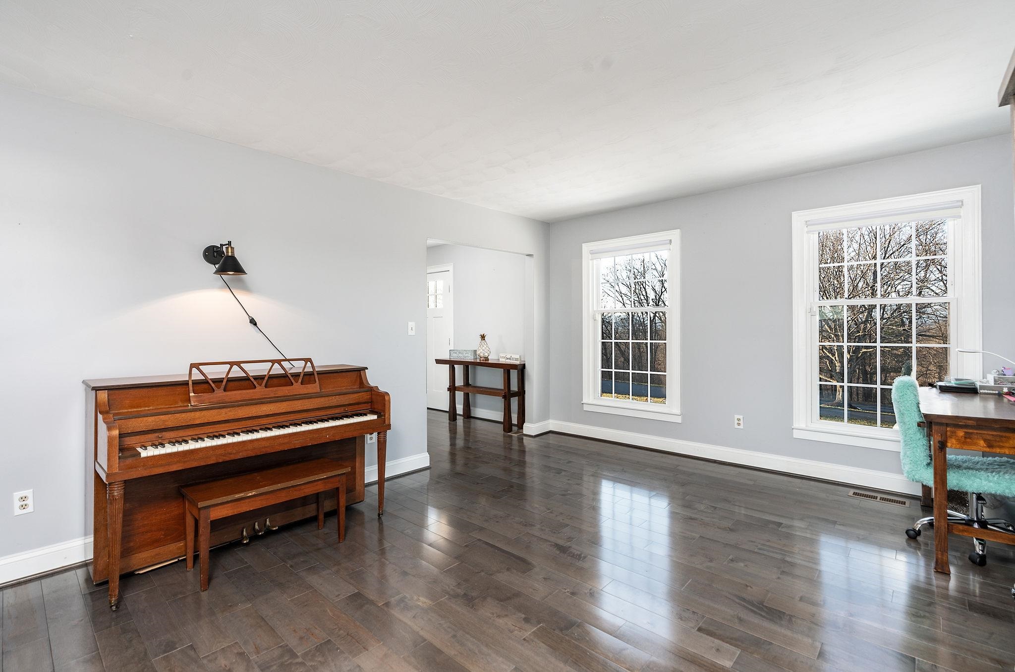441 Barrenridge Road Fishersville, VA 22939 - Photo 28 of 71 a living room with furniture a piano and a window