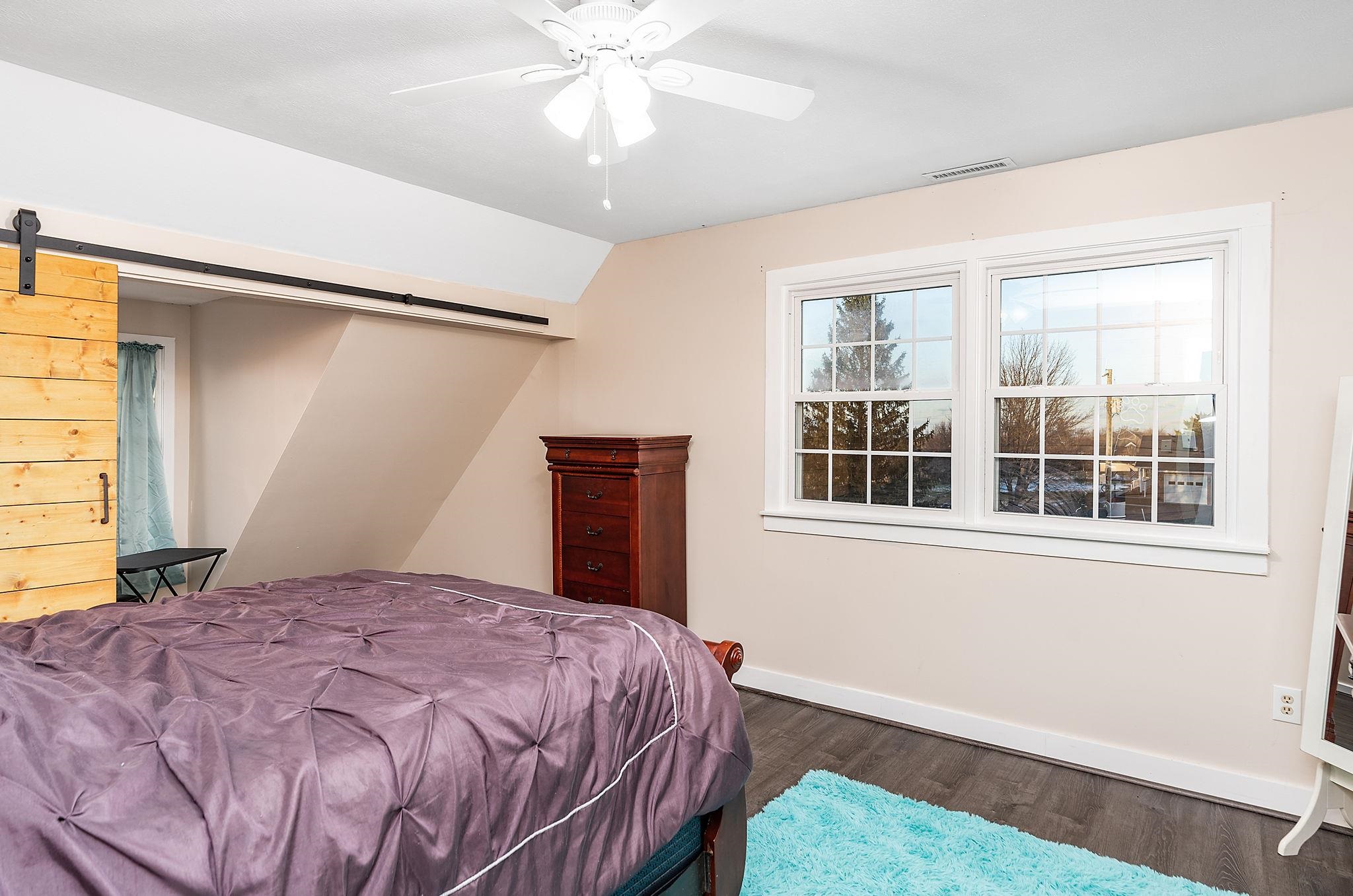 441 Barrenridge Road Fishersville, VA 22939 - Photo 40 of 71 a bedroom with a bed and a window