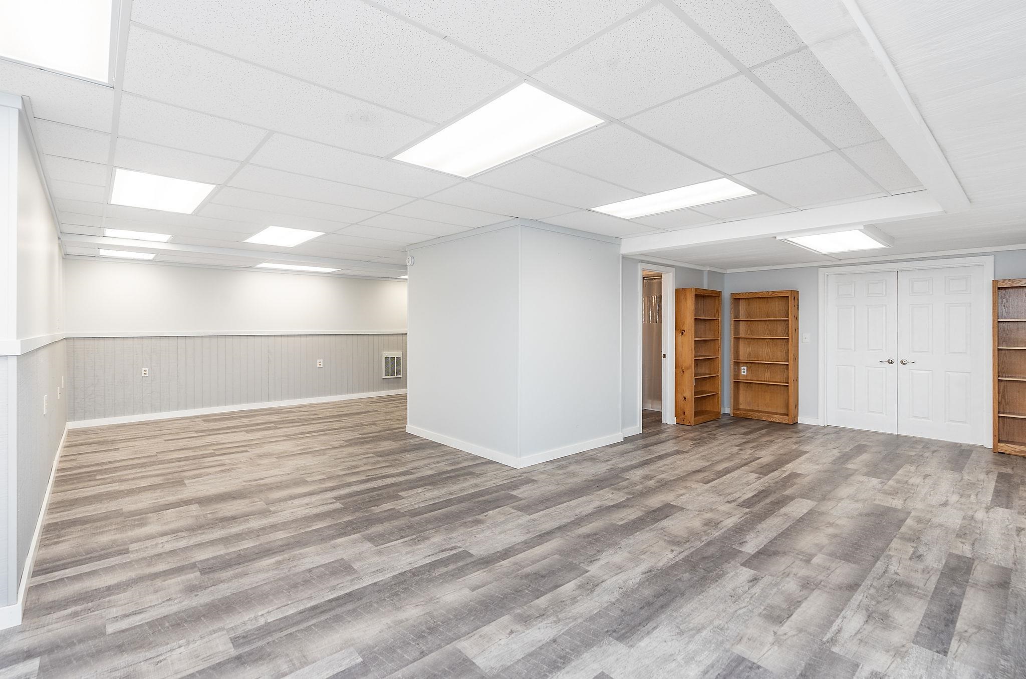 441 Barrenridge Road Fishersville, VA 22939 - Photo 44 of 71 a view of an empty room with wooden floor