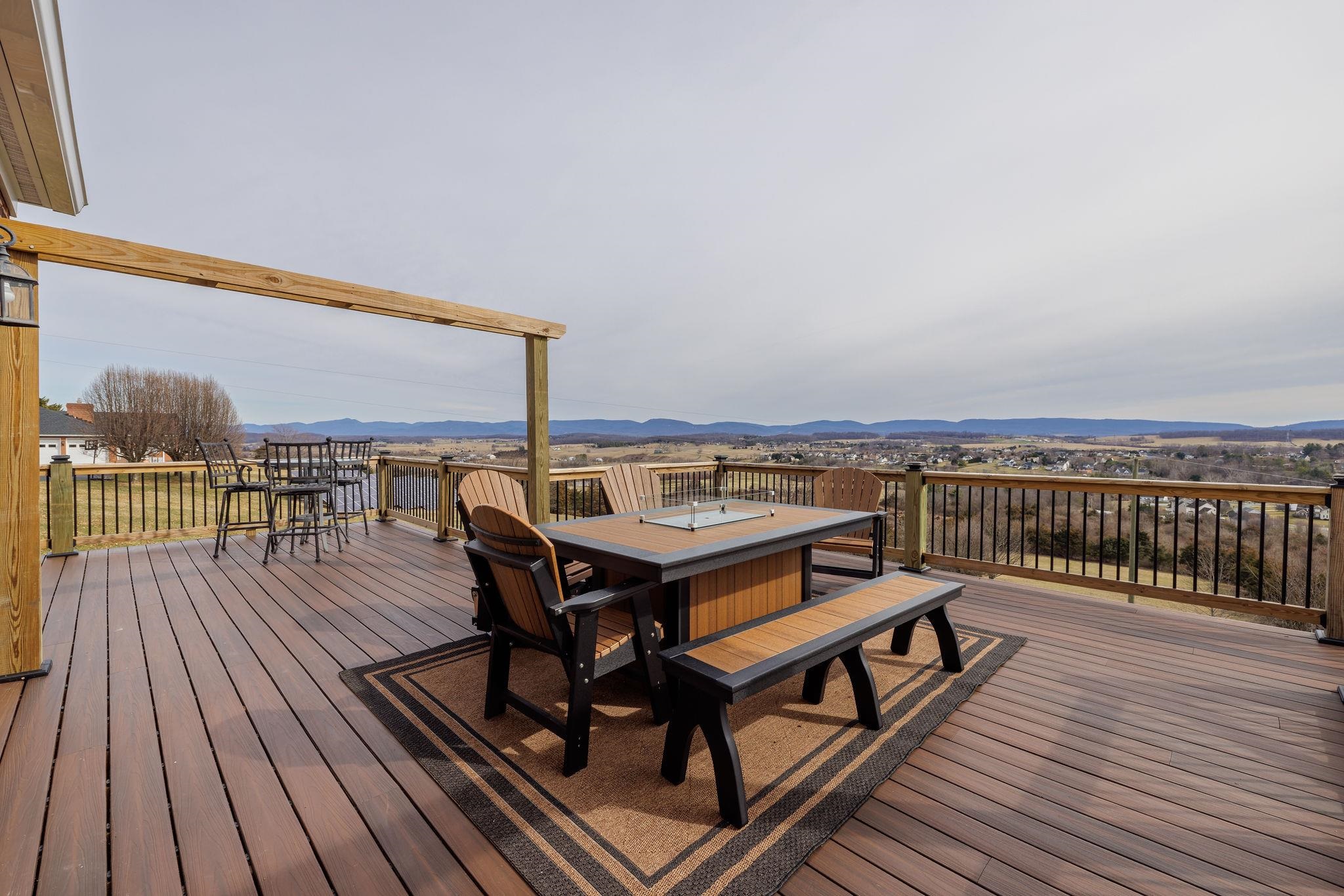 441 Barrenridge Road Fishersville, VA 22939 - Photo 48 of 71 a view of a balcony with wooden floor and seating space