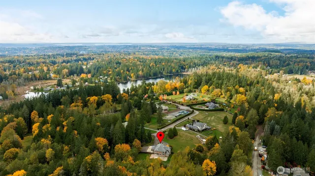 a view of lake with green space