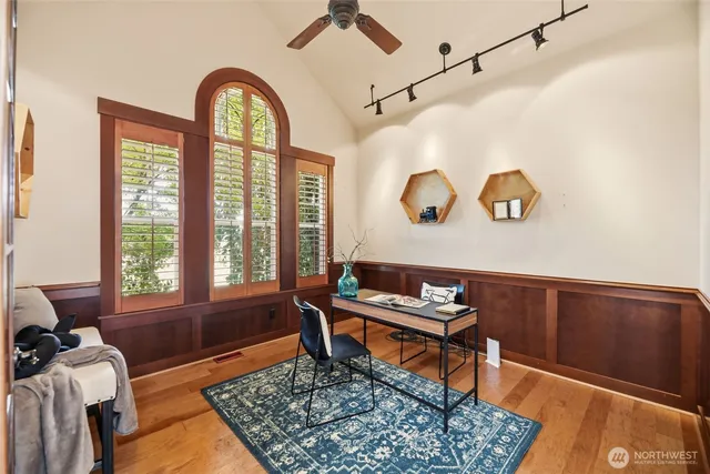 a living room with furniture and a rug