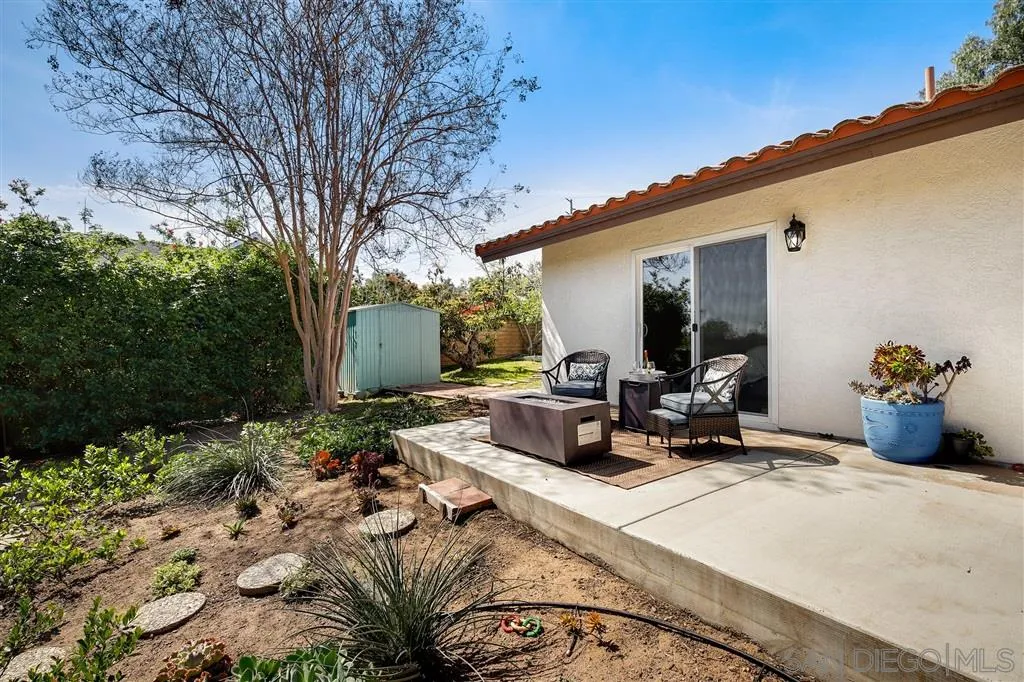 1285 Palomino Road Fallbrook, CA 92028 - Photo 14 of 25 a view of a backyard with sitting area