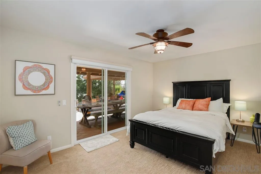 1285 Palomino Road Fallbrook, CA 92028 - Photo 17 of 25 a bedroom with a bed and window