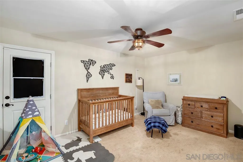 1285 Palomino Road Fallbrook, CA 92028 - Photo 18 of 25 a bedroom with furniture and a window