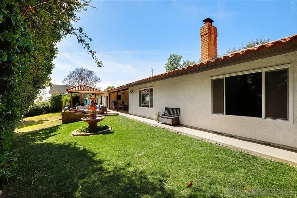 1285 Palomino Road Fallbrook, CA 92028 - Photo 23 of 25 a view of a house with backyard porch and sitting area
