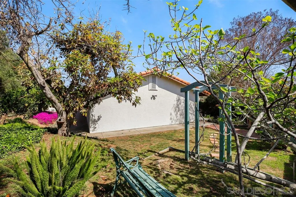 1285 Palomino Road Fallbrook, CA 92028 - Photo 25 of 25 a view of a flower in a yard