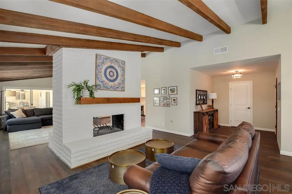 1285 Palomino Road Fallbrook, CA 92028 - Photo 4 of 25 a living room with furniture and a fireplace