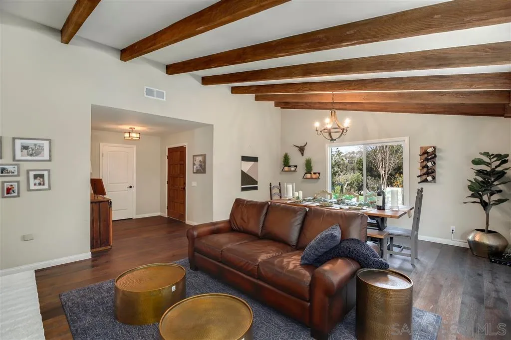 1285 Palomino Road Fallbrook, CA 92028 - Photo 5 of 25 a living room with furniture and a large window