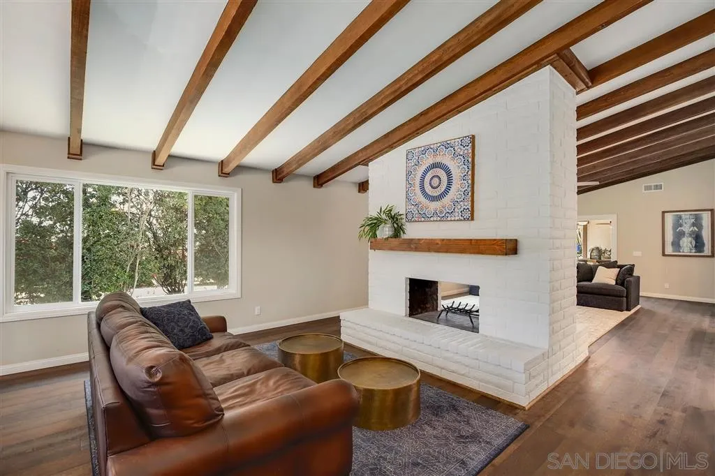 1285 Palomino Road Fallbrook, CA 92028 - Photo 7 of 25 a living room with furniture and a floor to ceiling window
