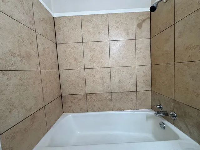 a bathroom with a bathtub