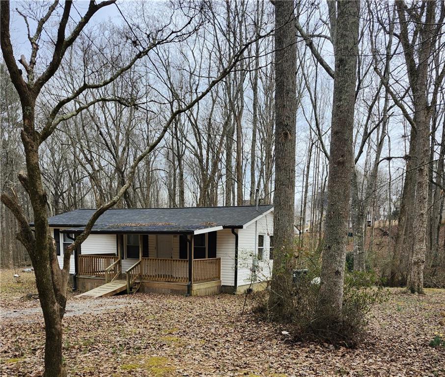 62 McClure Road Temple, GA 30179 - Photo 2 of 12 a front view of a house with garden