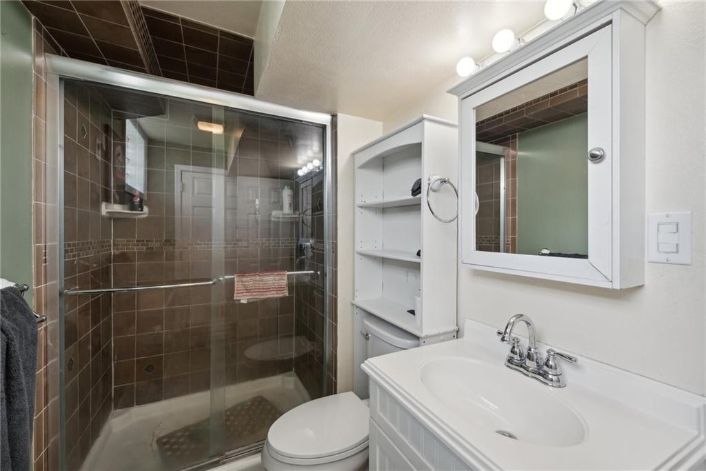 421 Dick Station Road Irwin, PA 15642 - Photo 8 of 36 1st floor full bathroom