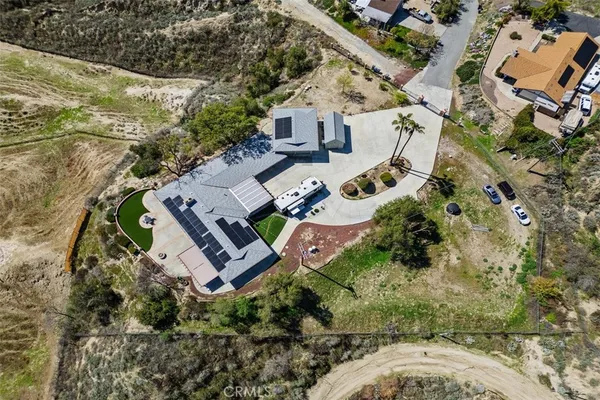 an aerial view of residential house with outdoor space