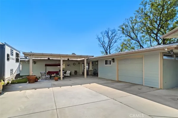 a view of a car park in front of house