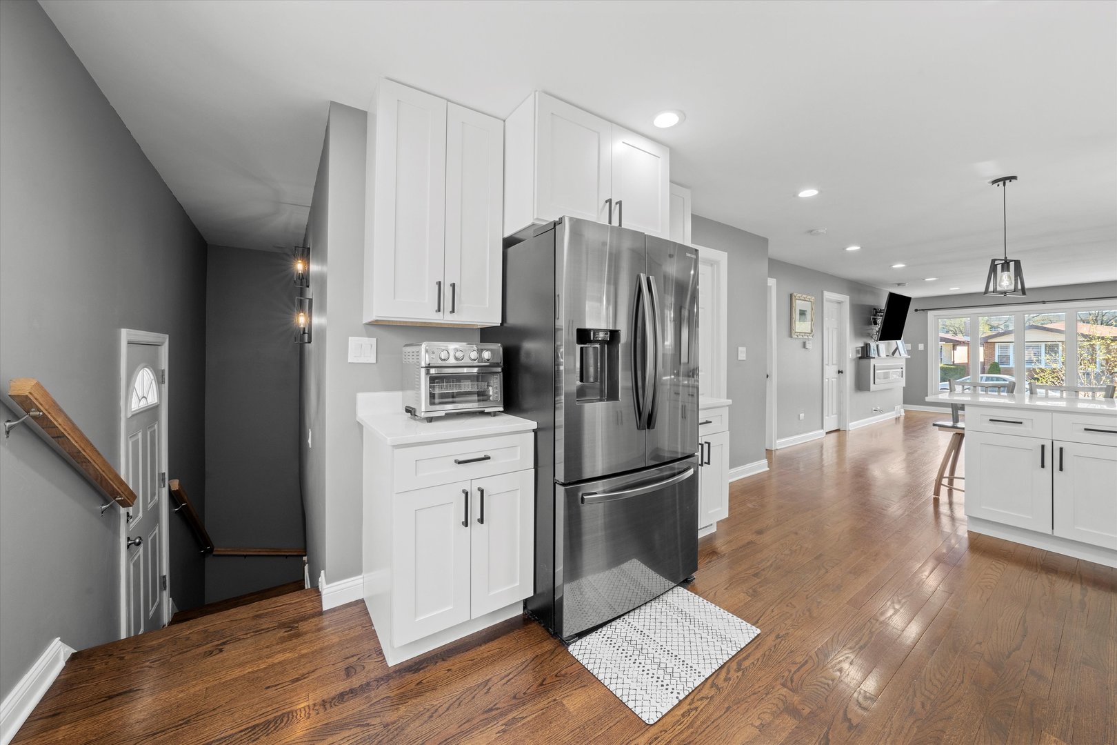 7114 West 64th Street Chicago, IL 60638 - Photo 15 of 43 a kitchen with stainless steel appliances granite countertop a refrigerator and a stove