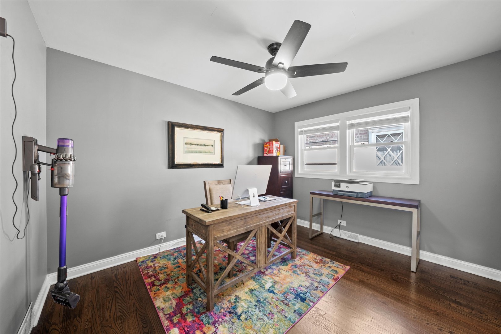 7114 West 64th Street Chicago, IL 60638 - Photo 21 of 43 a work room with furniture wooden floor and window
