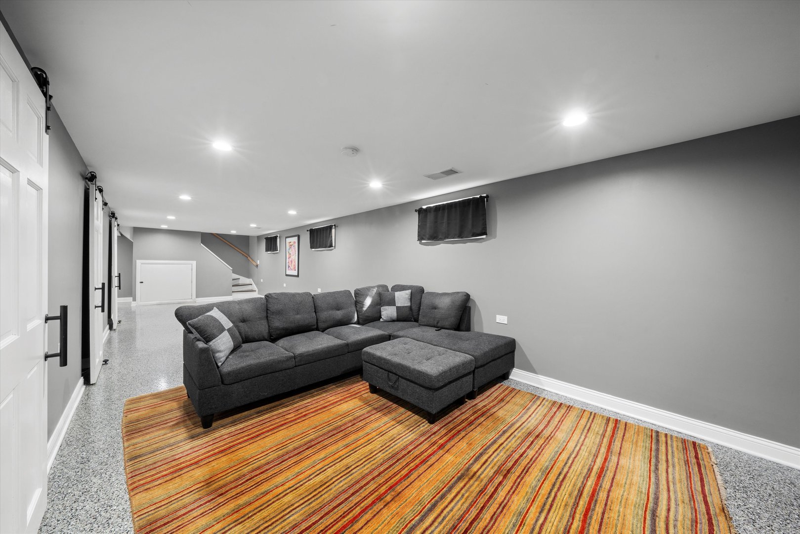 7114 West 64th Street Chicago, IL 60638 - Photo 27 of 43 a living room with furniture and a wooden floor