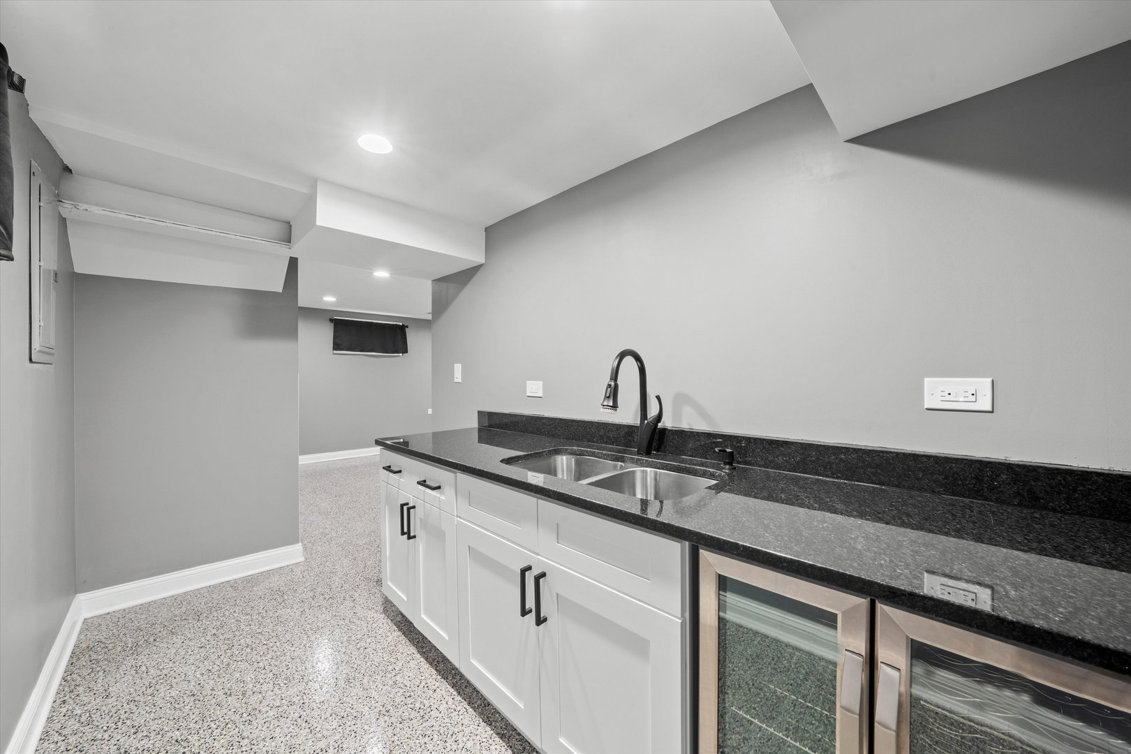 7114 West 64th Street Chicago, IL 60638 - Photo 31 of 43 a kitchen with a sink and cabinets