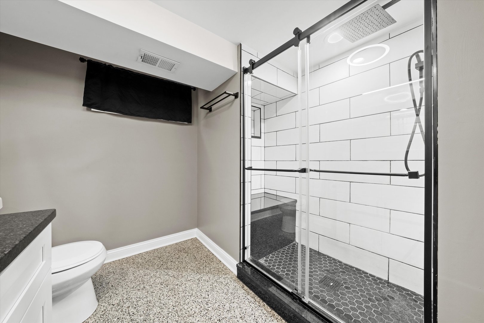 7114 West 64th Street Chicago, IL 60638 - Photo 32 of 43 a bathroom with a toilet and a shower