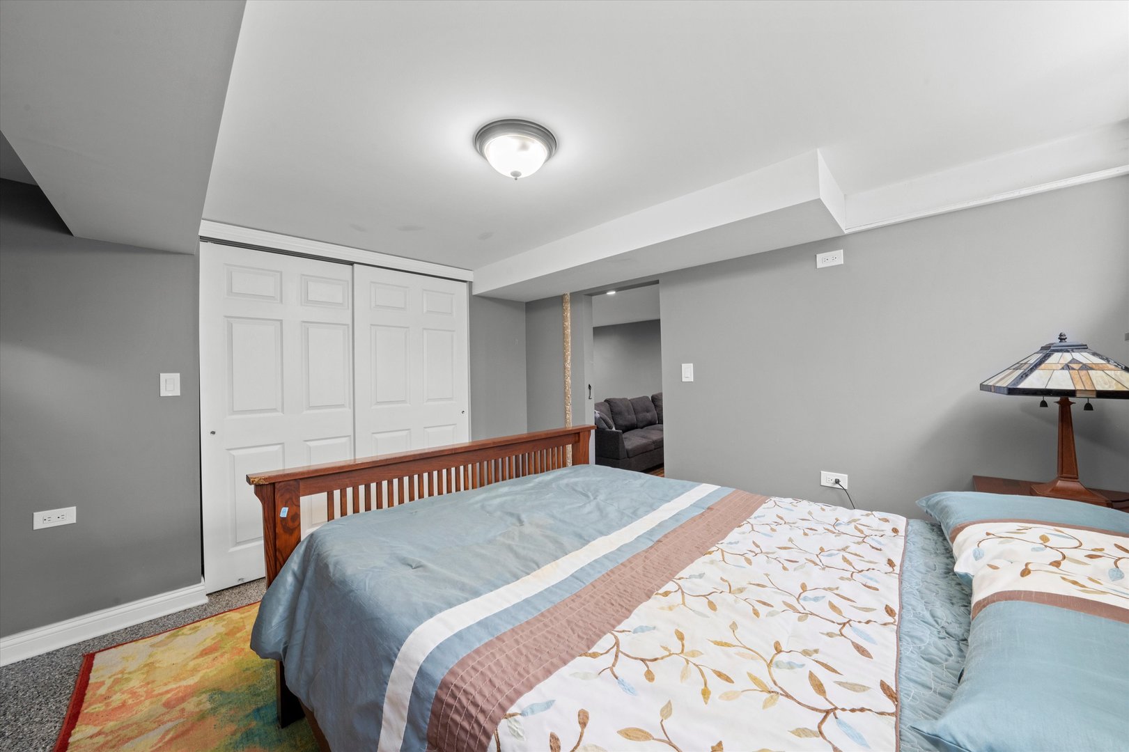 7114 West 64th Street Chicago, IL 60638 - Photo 36 of 43 a bedroom with a bed and a lamp on table