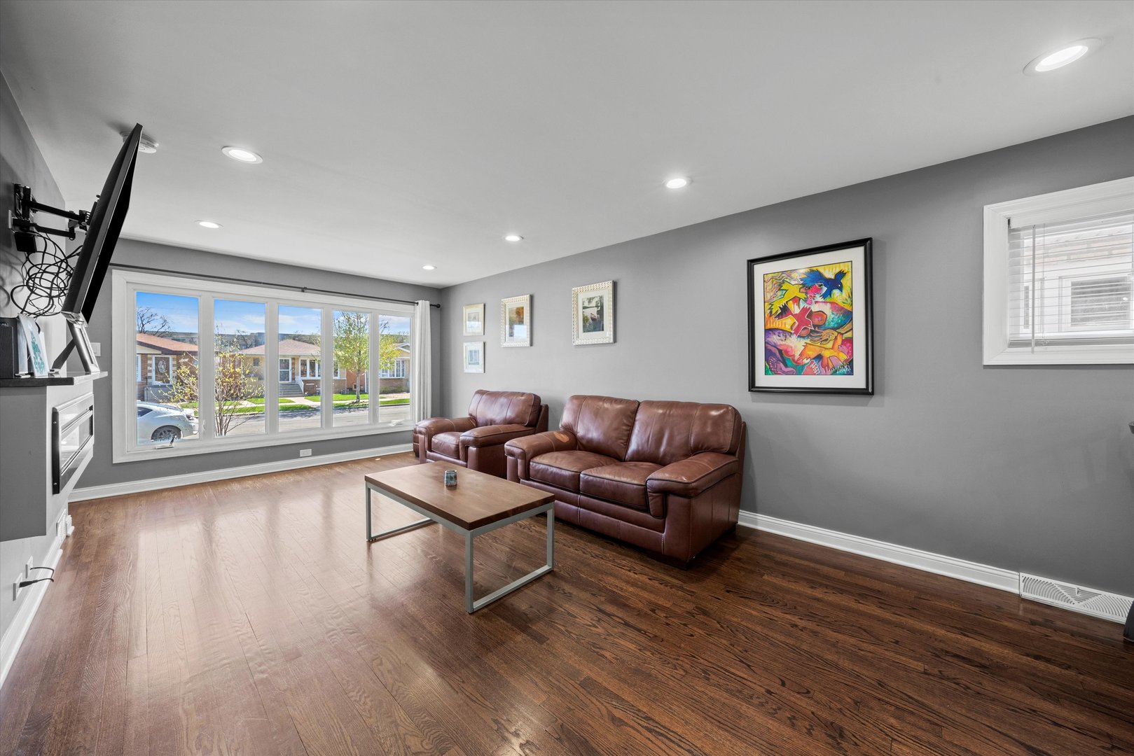 7114 West 64th Street Chicago, IL 60638 - Photo 6 of 43 a living room with furniture and a large window