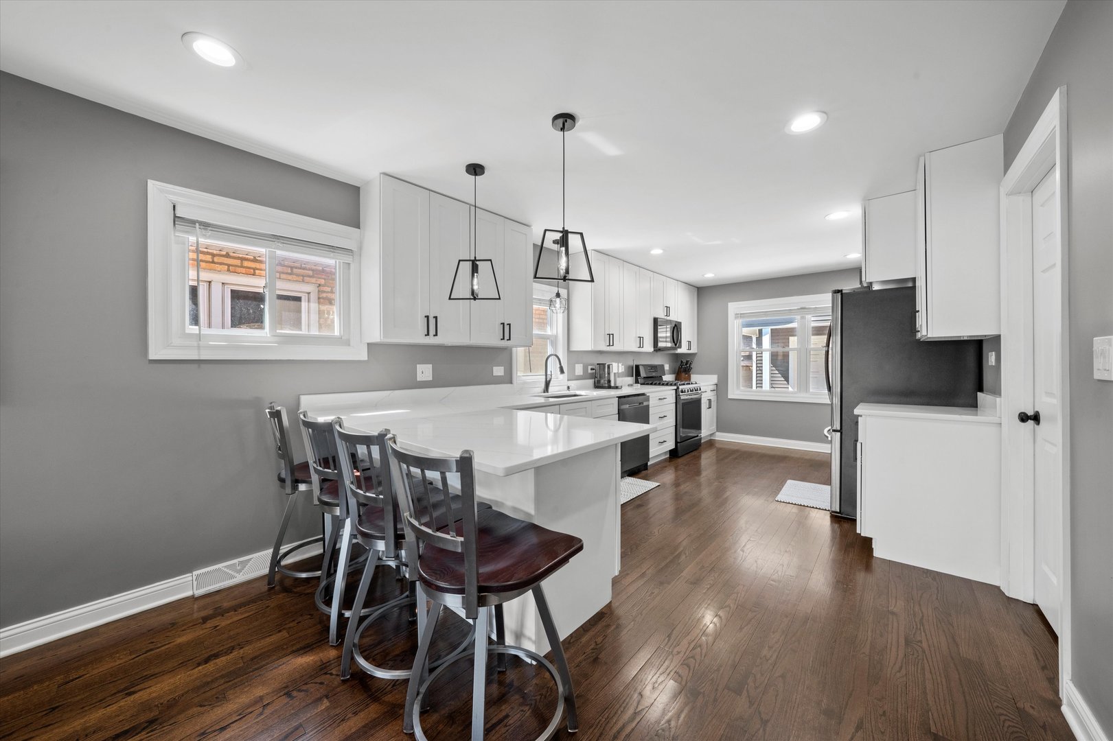 7114 West 64th Street Chicago, IL 60638 - Photo 10 of 43 a view of kitchen with cabinets table and chairs