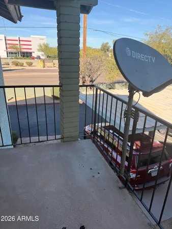 a view of a porch with furniture