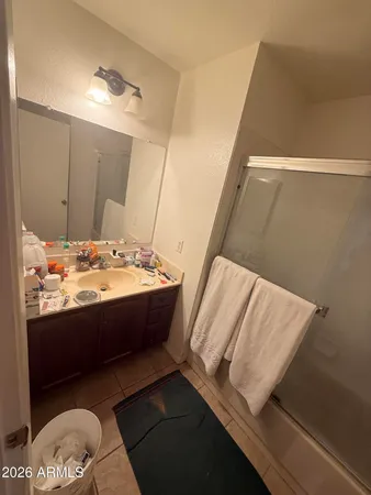 a view of living room with furniture and wooden floor
