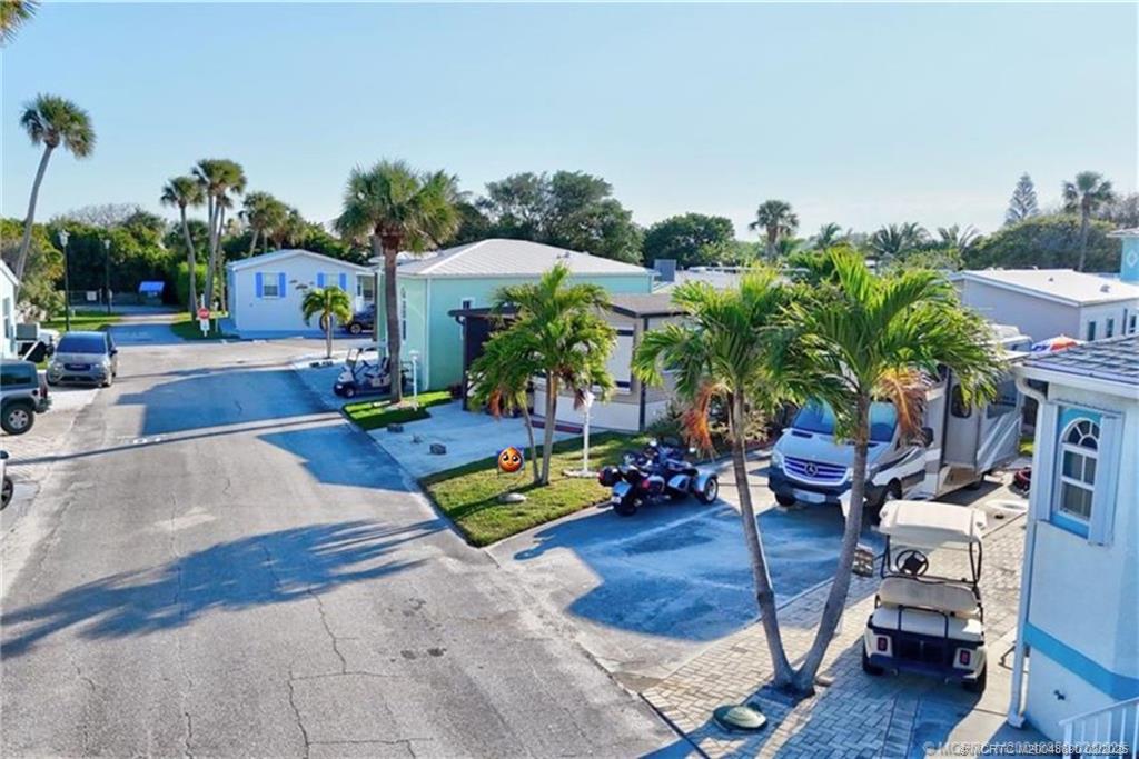 10701 South Ocean Drive, Unit 773 Jensen Beach, FL 34957 - Photo 2 of 13 an outdoor space with patio furniture