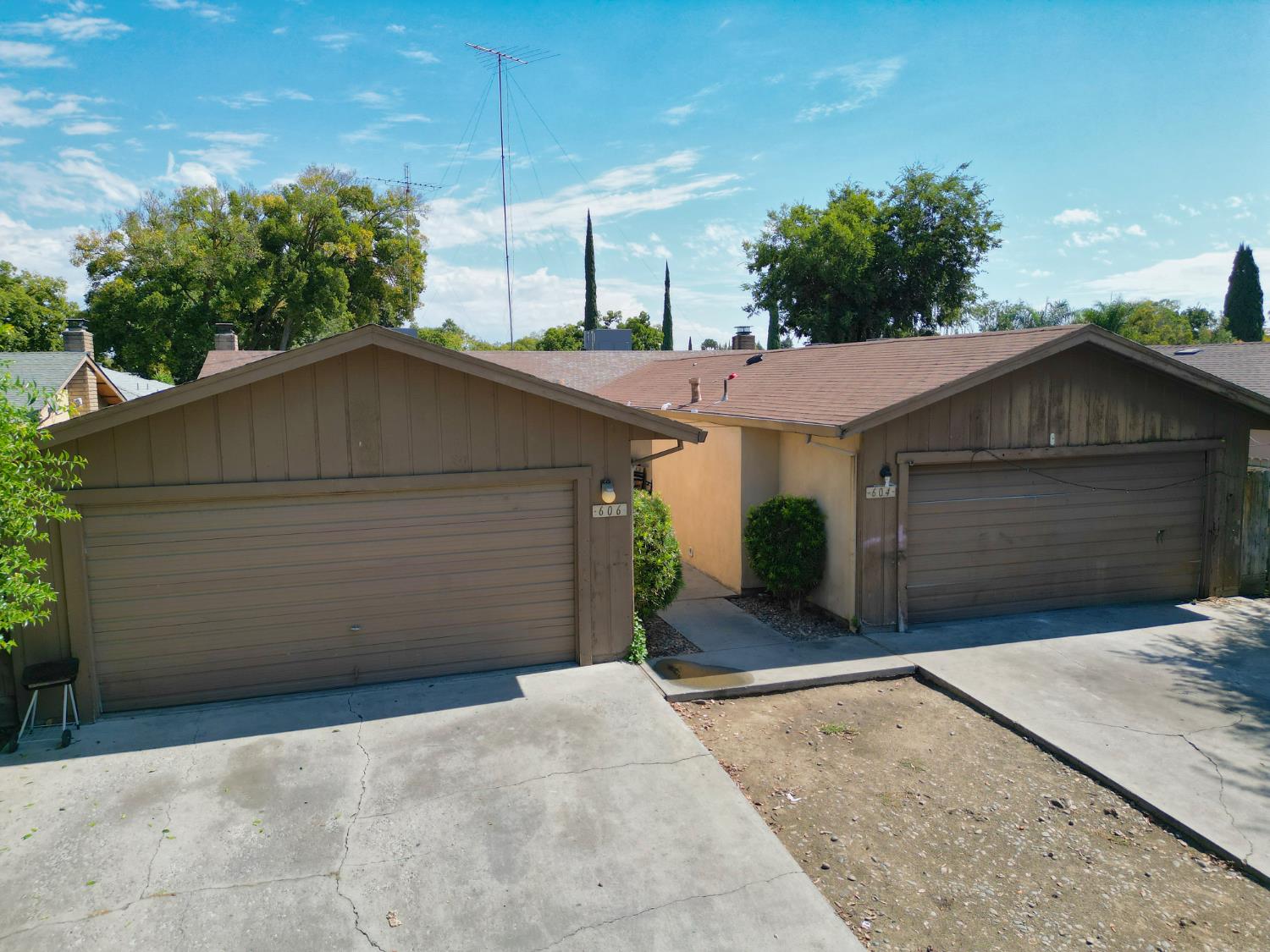 604 Fort Sumpter Drive Modesto, CA 95354 - Photo 4 of 10 a house with a yard and garage