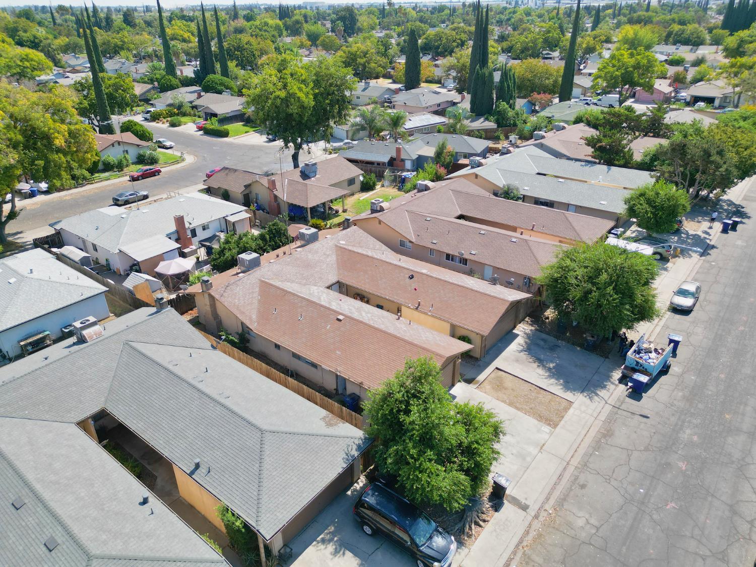 604 Fort Sumpter Drive Modesto, CA 95354 - Photo 8 of 10 an aerial view of a city with lots of residential buildings