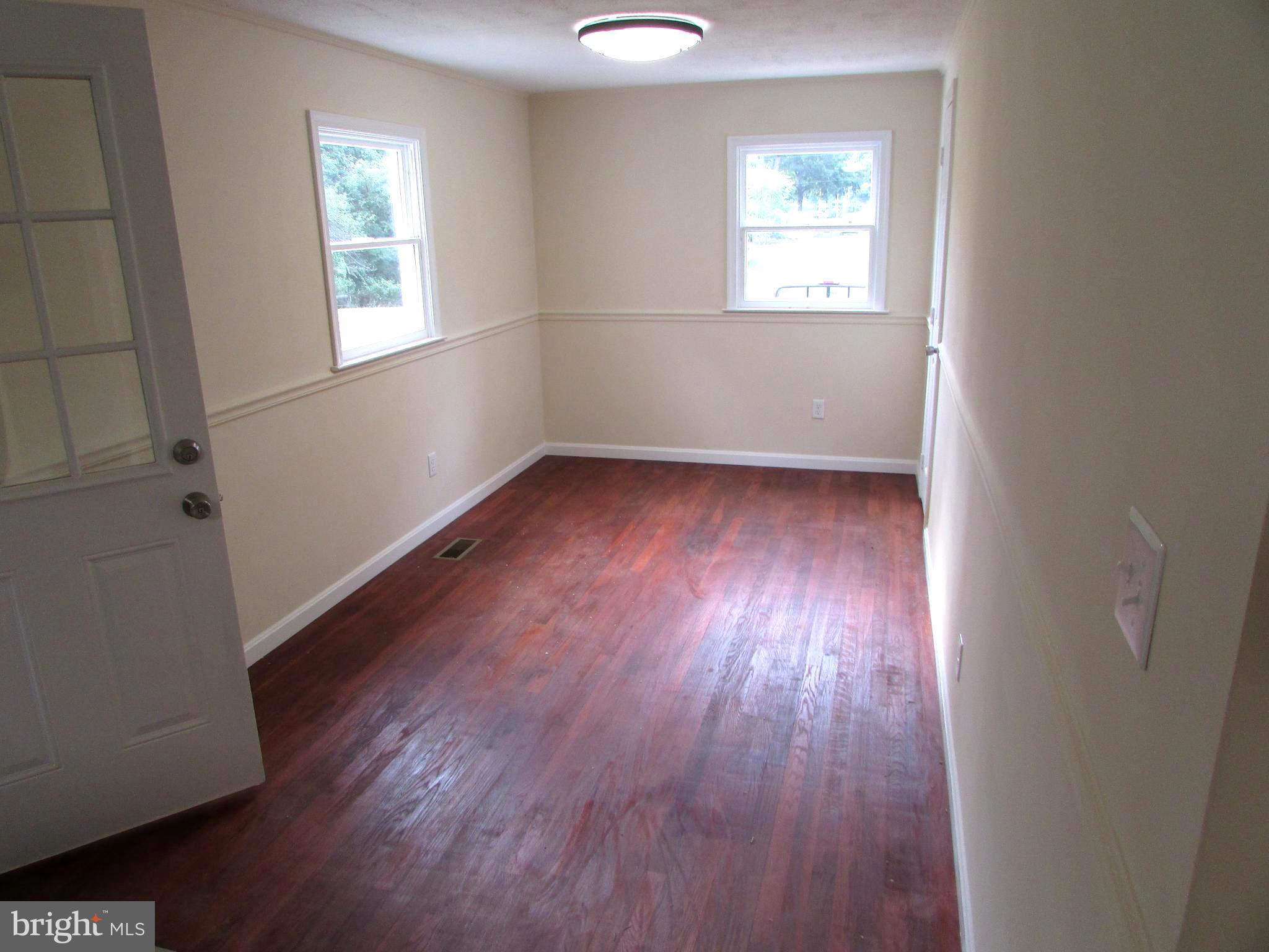 10380 Faulkner Road Faulkner, MD 20632 - Photo 14 of 20 Hardwood Floored Dining Room