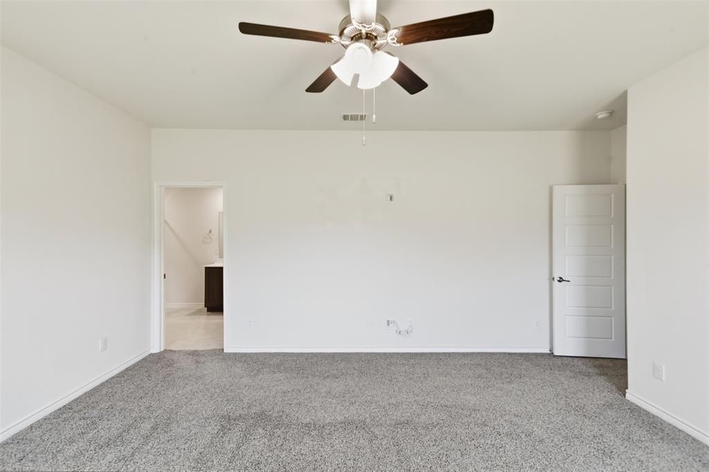 415 Boston Road Fate, TX 75189 - Photo 16 of 40 Primary bedroom towards ensuite bath