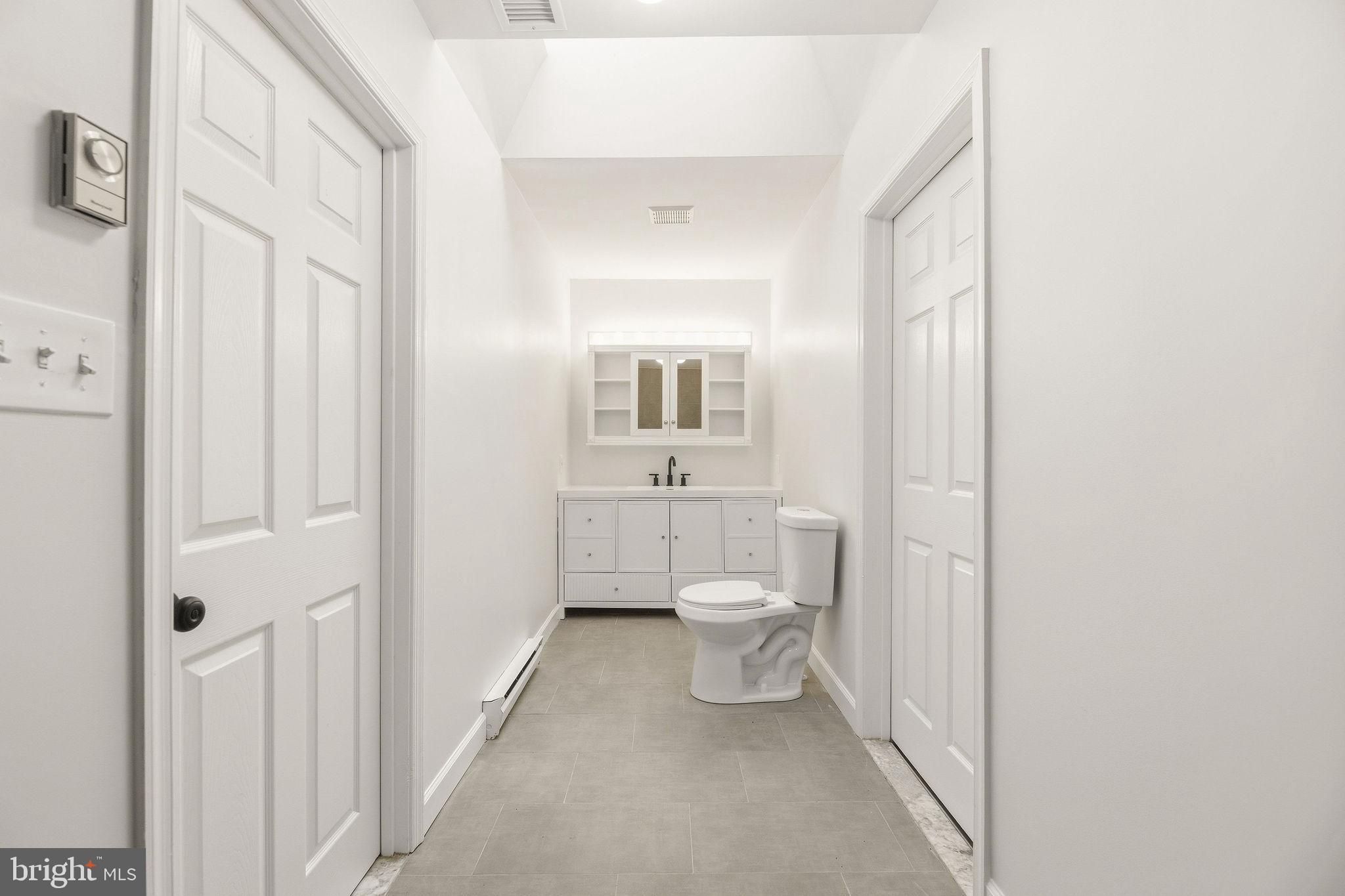 6664 Old Solomons Island Road Friendship, MD 20758 - Photo 18 of 39 Updated bathroom primary