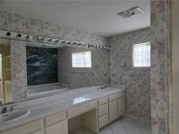 a view of a house with a door and wooden floor