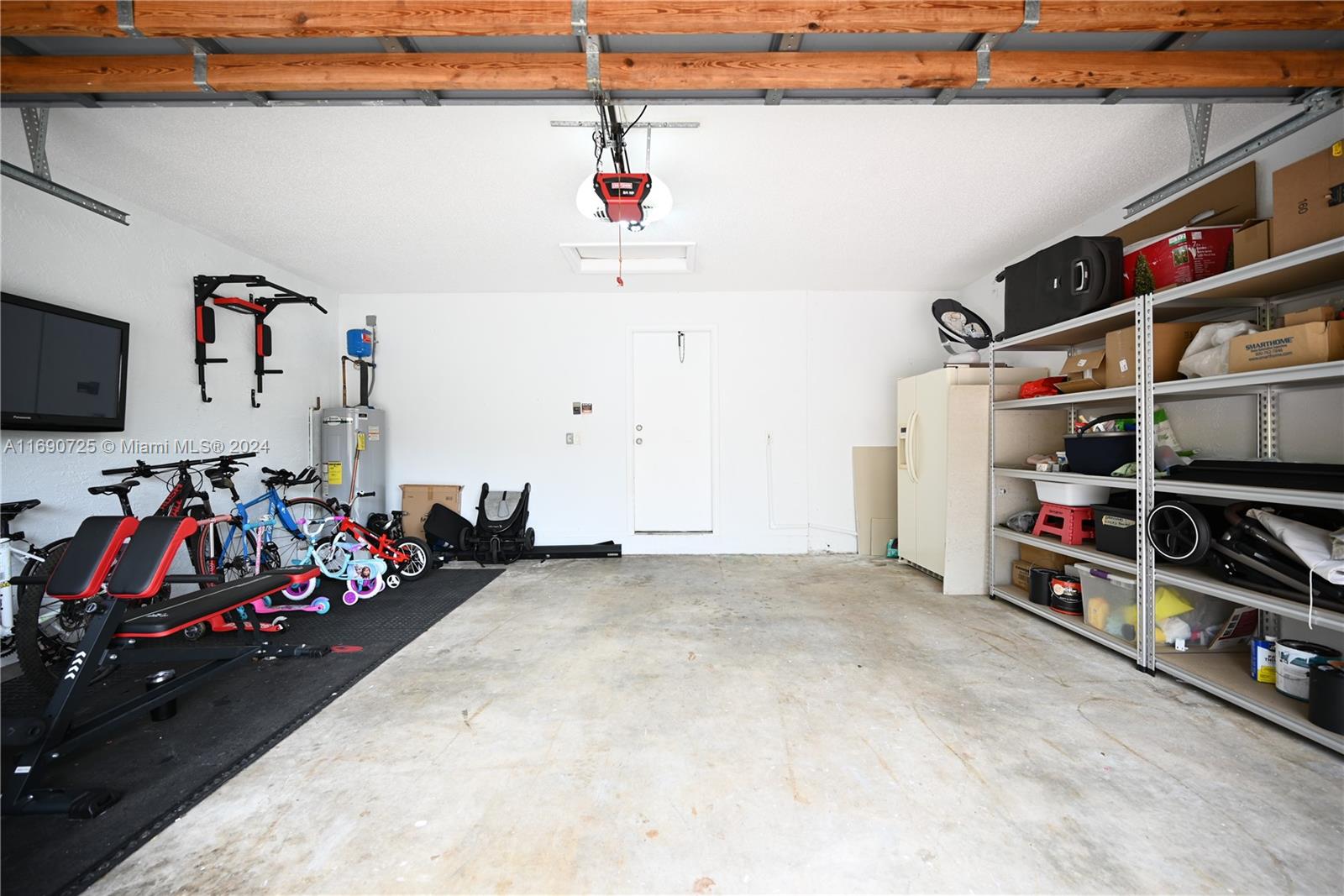 2497 Southwest 163rd Avenue Miramar, FL 33027 - Photo 23 of 50 a view of a garage with storage