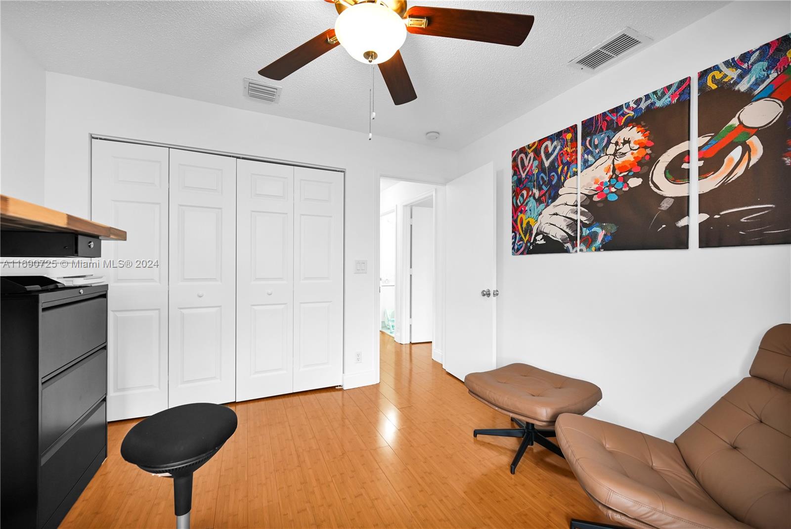 2497 Southwest 163rd Avenue Miramar, FL 33027 - Photo 41 of 50 a view of a livingroom with furniture and wooden floor