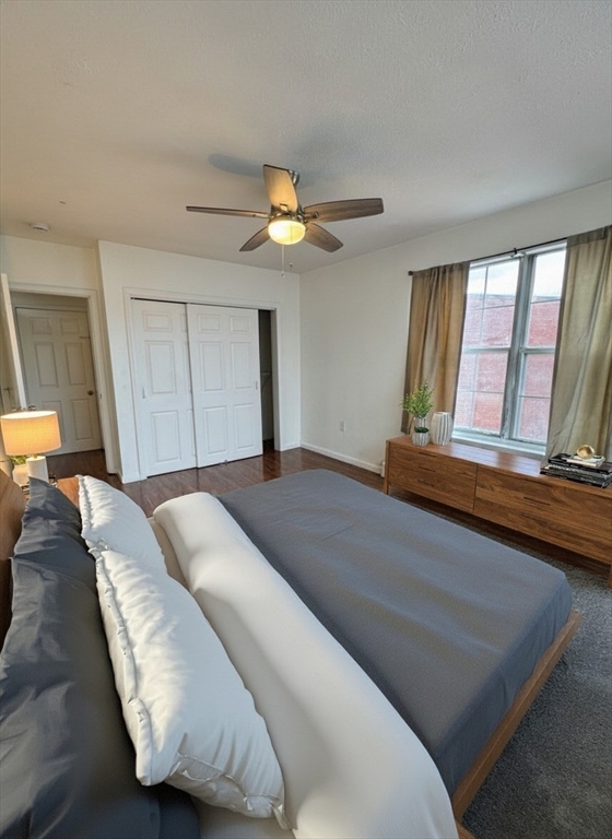 20 Knox Street, Unit 23 Lawrence, MA 01841 - Photo 14 of 15 a bedroom with a bed and a large window