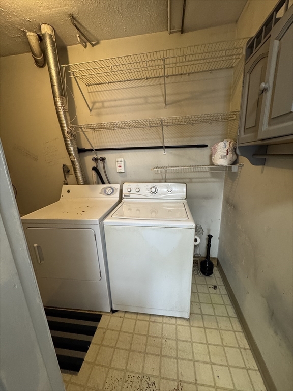 20 Knox Street, Unit 23 Lawrence, MA 01841 - Photo 15 of 15 a utility room with dryer and washer