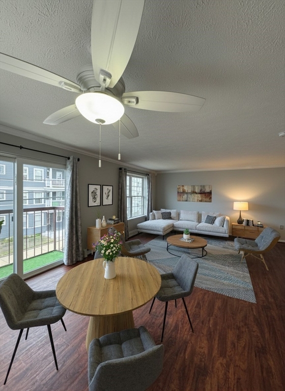20 Knox Street, Unit 23 Lawrence, MA 01841 - Photo 5 of 15 a living room with furniture a window and a table