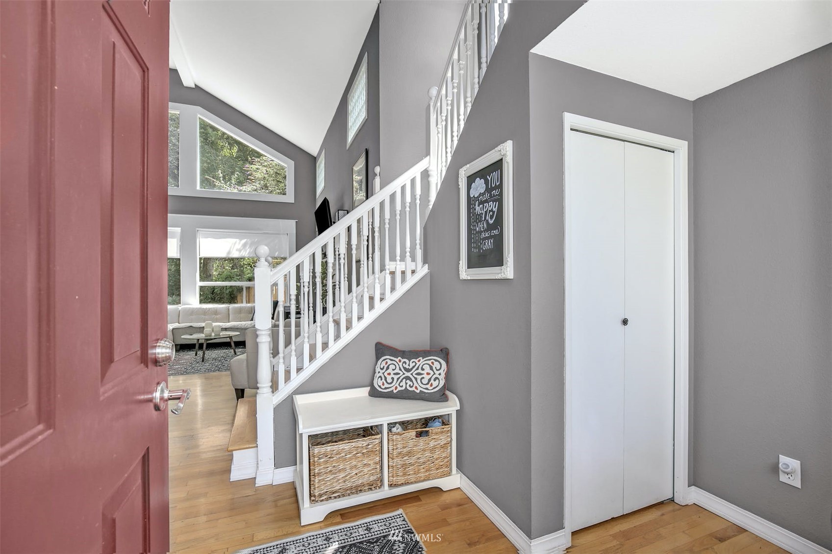 2057 Southeast 8th Place Renton, WA 98057 - Photo 3 of 23 a view of entryway livingroom and hall with wooden floor