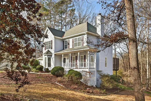 front view of a house with a yard