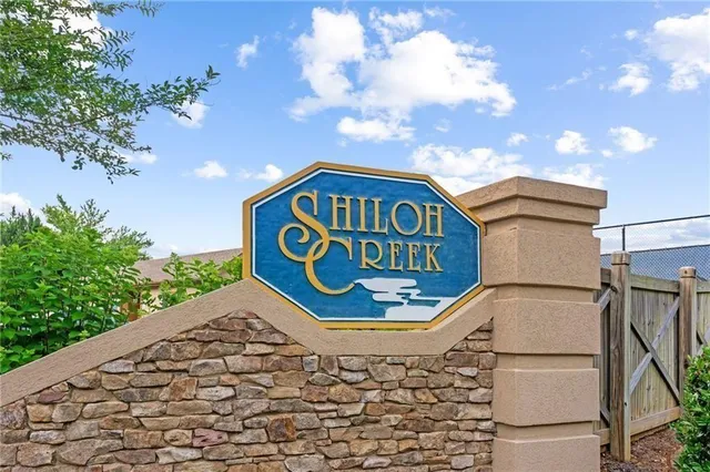 a sign that is on the side of the road